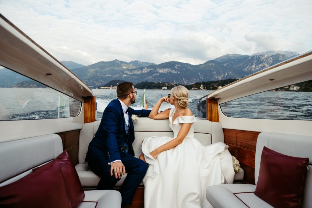 Bride and groom enjoying their boat ride on Lake Como during their Elopement